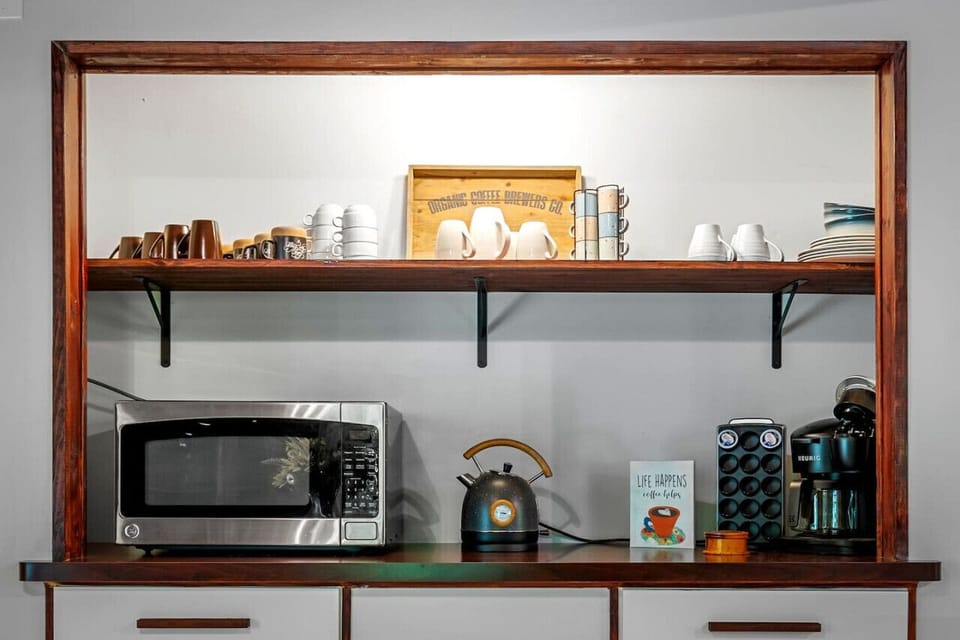 Cook like a chef in this fully appointed kitchen! Complete with a spacious island, dishwasher, coffee station, and all major appliances—this is your home away from home for culinary delights.