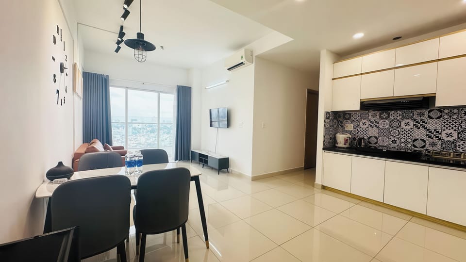 Deluxe Apartment, 2 Bedrooms, Kitchen, City View | Living area | 50-inch Smart TV with digital channels