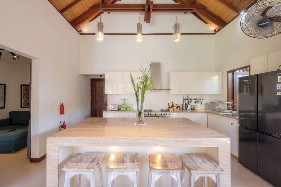 Deluxe Villa, Patio, Pool View | Private kitchen | Coffee/tea maker, electric kettle, toaster