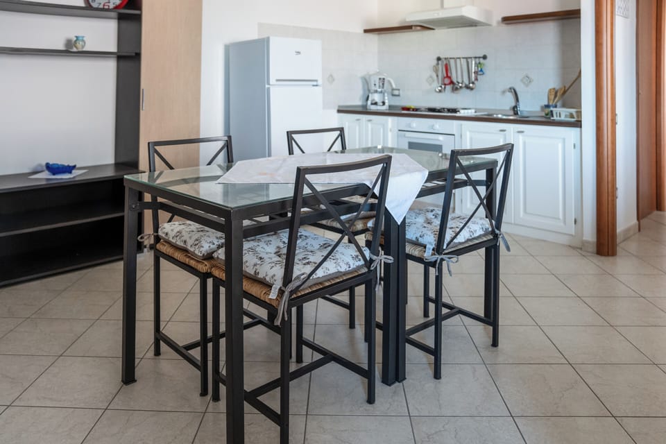 Apartment, 2 Bedrooms, Balcony | Living area | Flat-screen TV