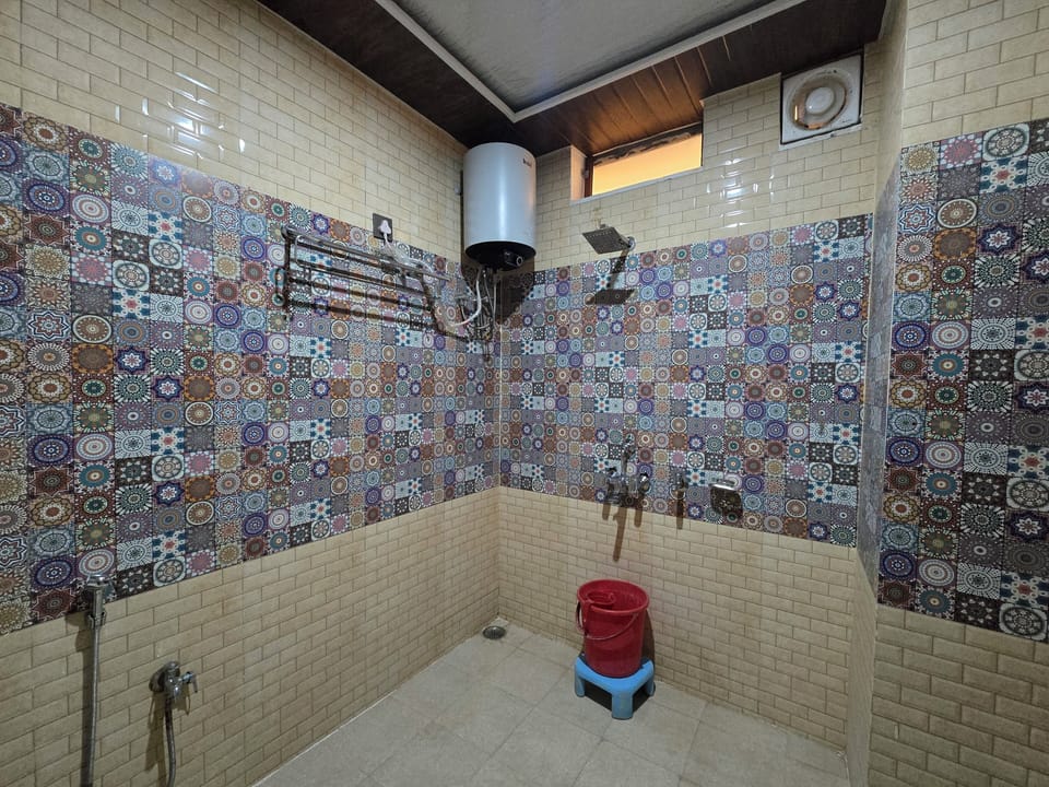 Shower, towels, soap, shampoo