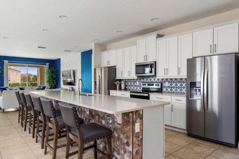 Gourmet Kitchen Haven: Discover culinary bliss at our spacious kitchen island, complete with dual fridges, a dishwasher, and all the essentials you need. Perfect for preparing meals and entertaining in style! ️✨‍