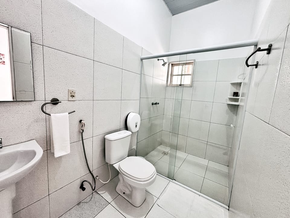 Basic Single Room, Balcony, Garden View | Bathroom | Shower, rainfall showerhead, hair dryer, bidet