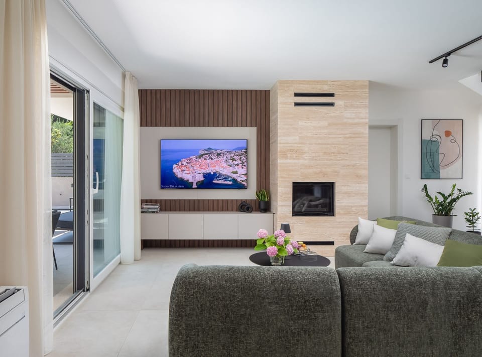 Villa (Four Bedroom Villa with Pool) | Living room | 32-inch flat-screen TV with satellite channels