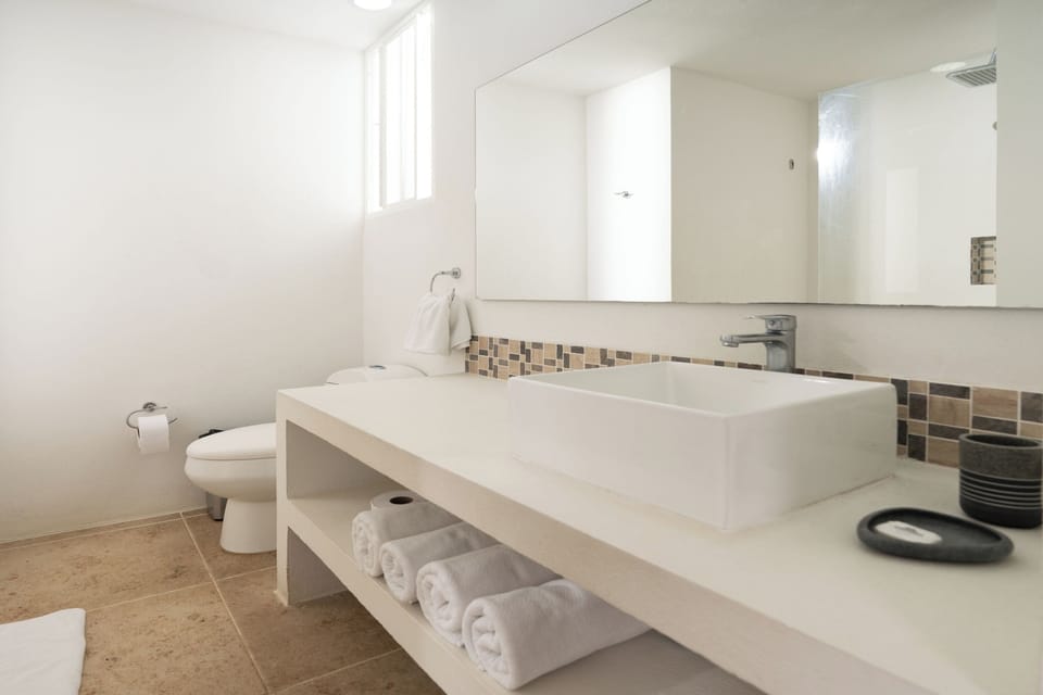 Shower, towels, soap, shampoo