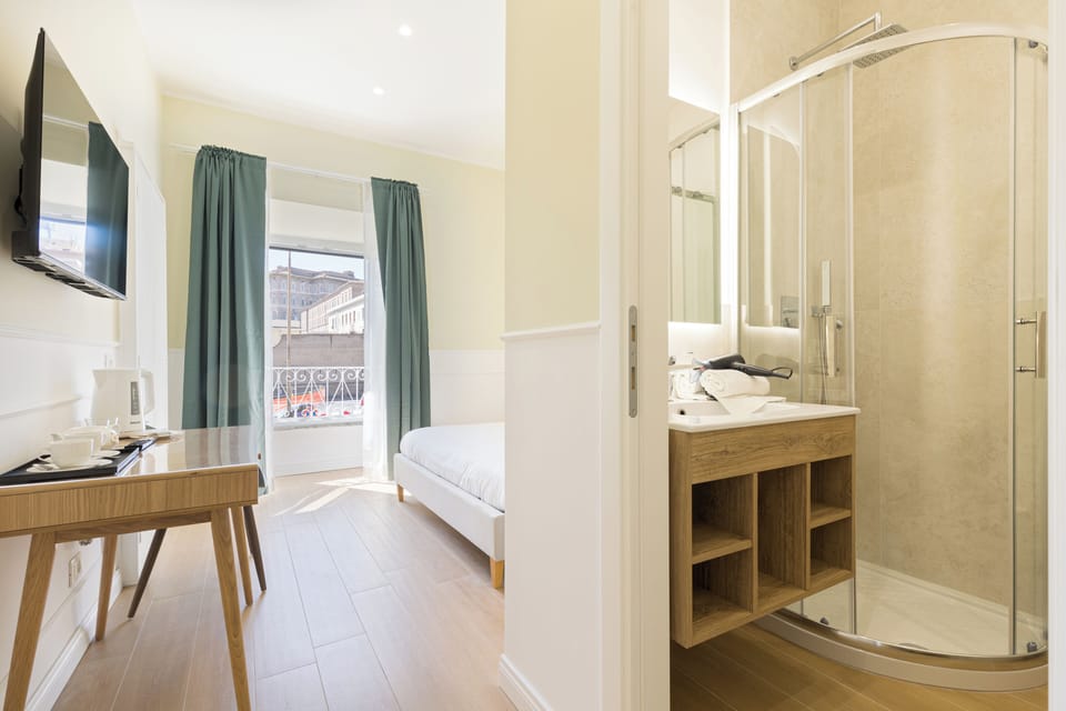 Deluxe Double Room, City View | In-room safe, desk, soundproofing, iron/ironing board