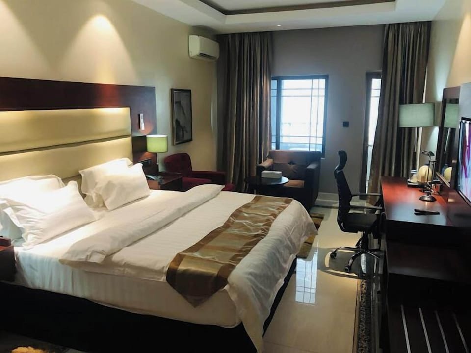 Family Room, Balcony, City View | Desk, laptop workspace, free WiFi