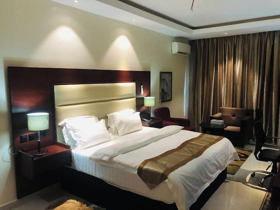 Family Room, Balcony, City View | Desk, laptop workspace, free WiFi