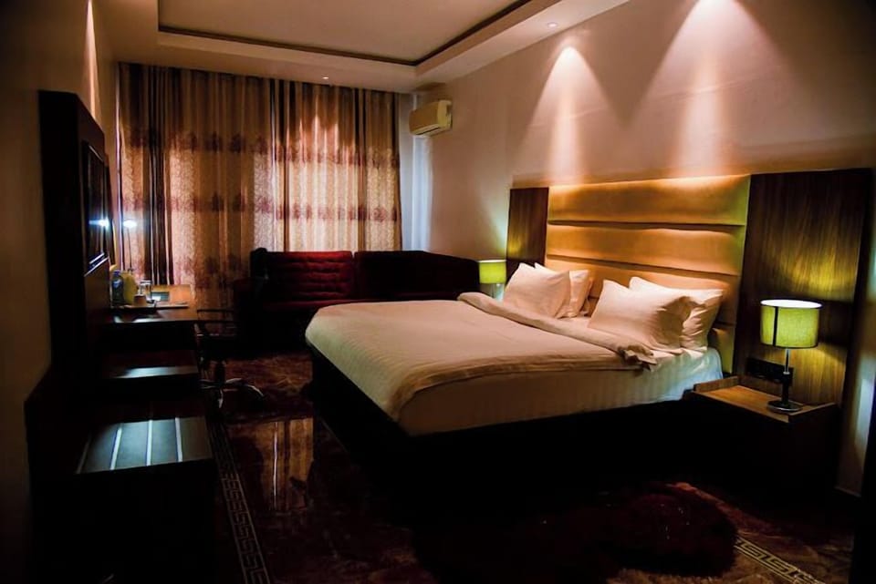 Family Room, Balcony, City View | Desk, laptop workspace, free WiFi