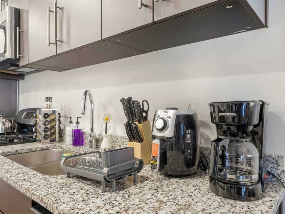 Coffee station w/ maker, pods & essentials for your morning routine