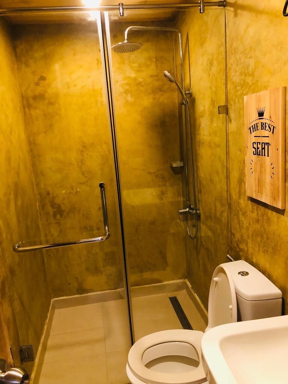 Shower, towels, soap, toilet paper