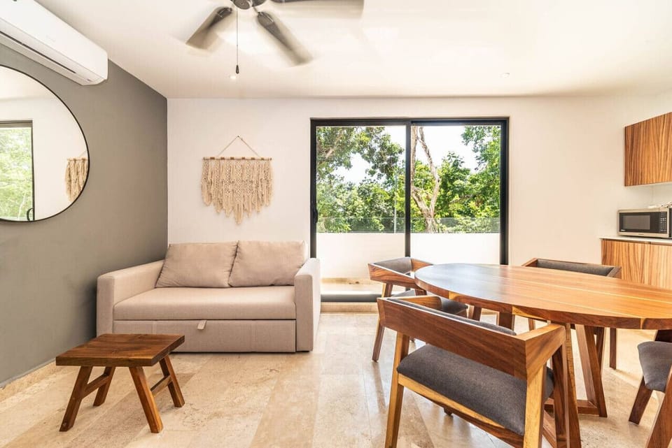 Spacious dining area for four, perfect for family meals or entertaining