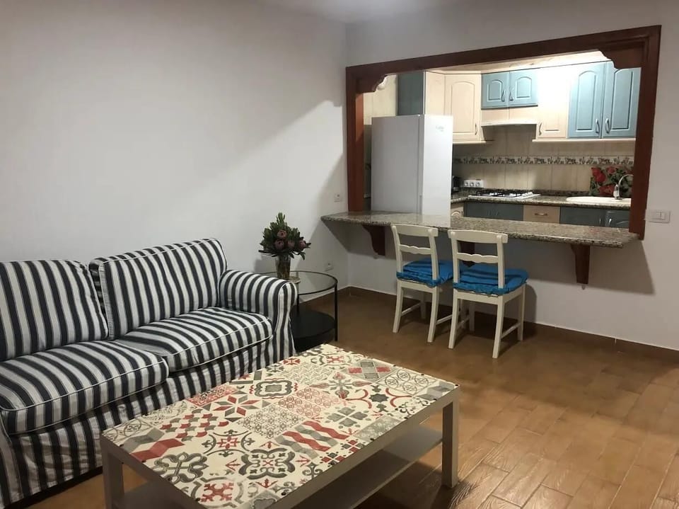 Comfort Apartment, Balcony, City View | Living area | Flat-screen TV