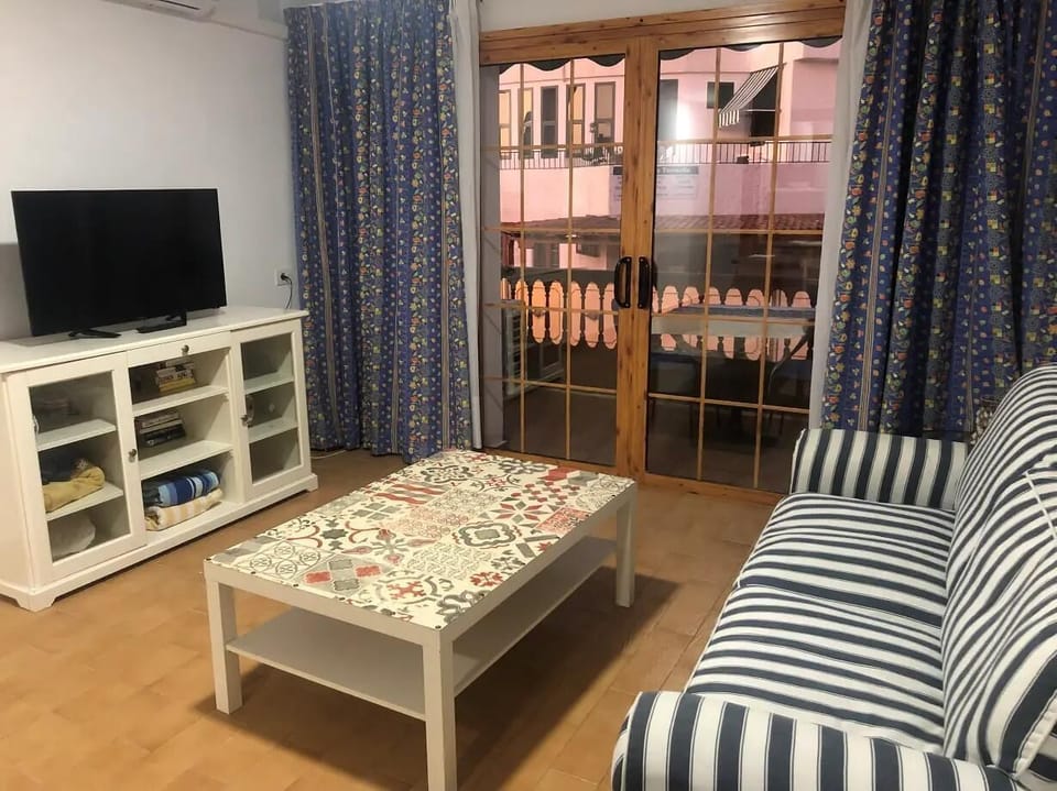 Comfort Apartment, Balcony, City View | Living area | Flat-screen TV