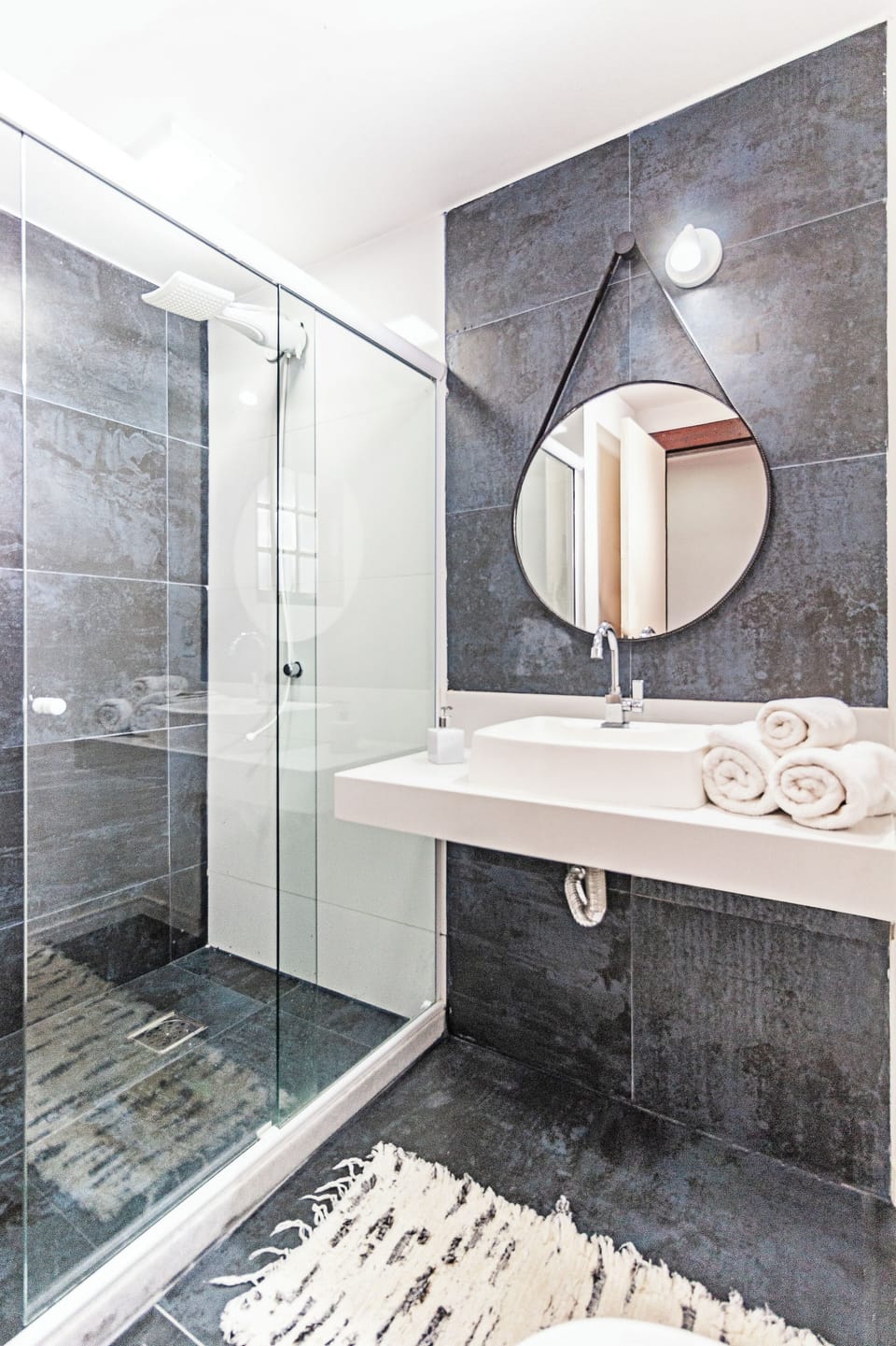 Shower, towels, soap, toilet paper