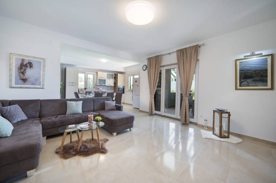 A modern living room has clean lines and minimalist furniture