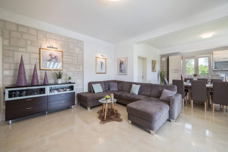 A modern living room has clean lines and minimalist furniture