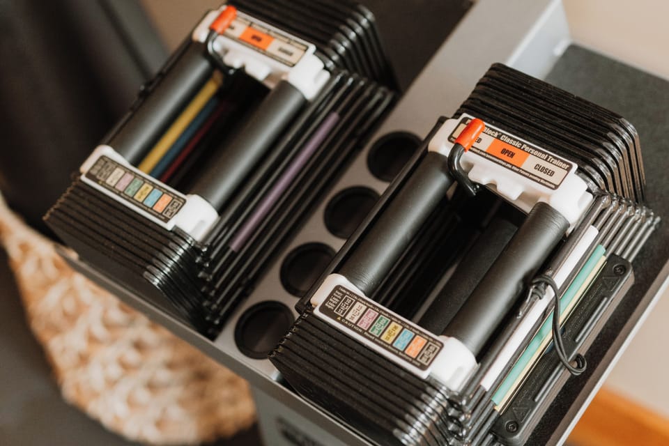 Stackable dumbbell set in the private fitness nook.