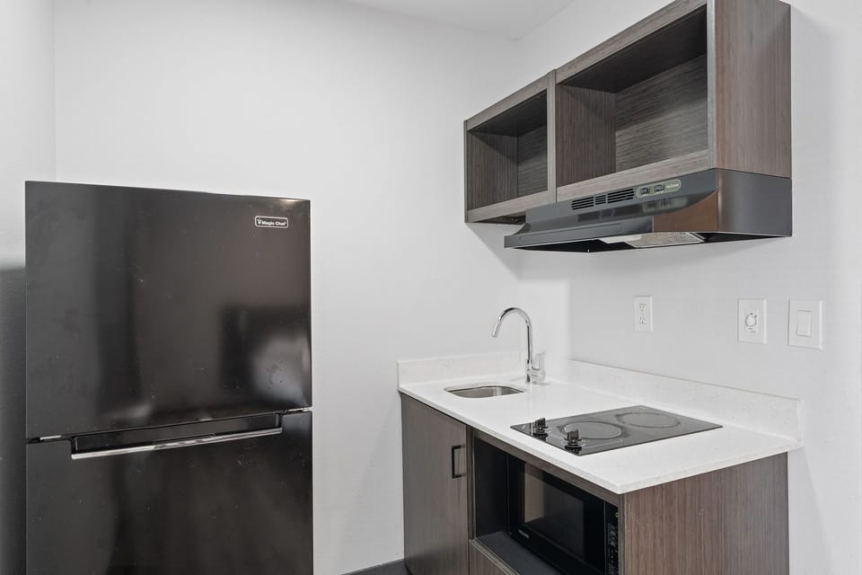 Studio, 1 Queen Bed, Non Smoking | Private kitchenette | Full-size fridge, microwave