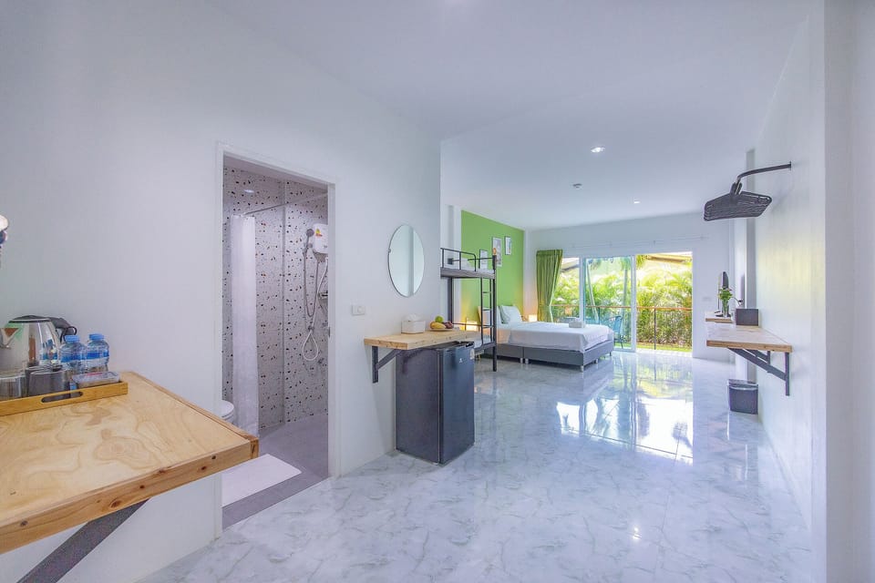 Family Double Room, Multiple Beds, Garden View | In-room safe, desk, laptop workspace, free WiFi