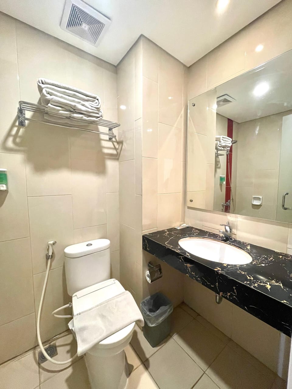 Shower, slippers, towels, soap