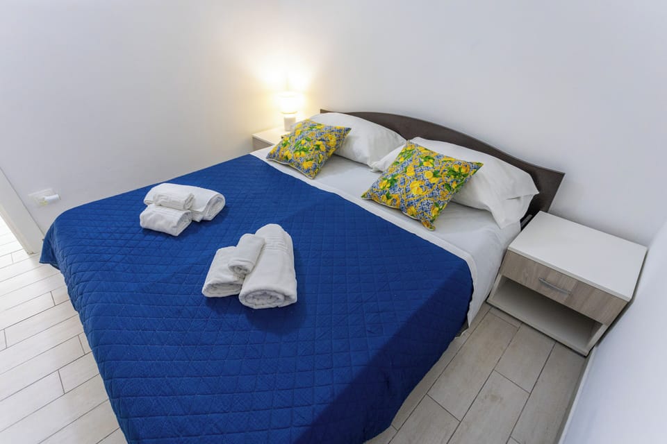 Apartment, 1 Bedroom, Patio | 1 bedroom, iron/ironing board, free WiFi