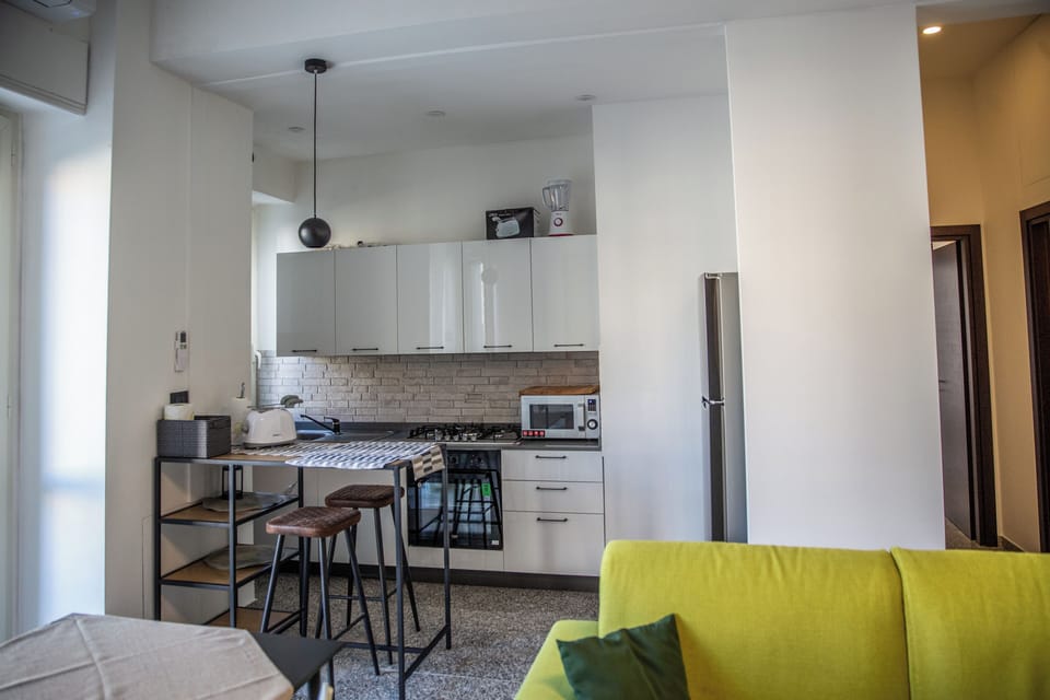 Apartment, 2 Bedrooms, Balcony | Living area | Flat-screen TV