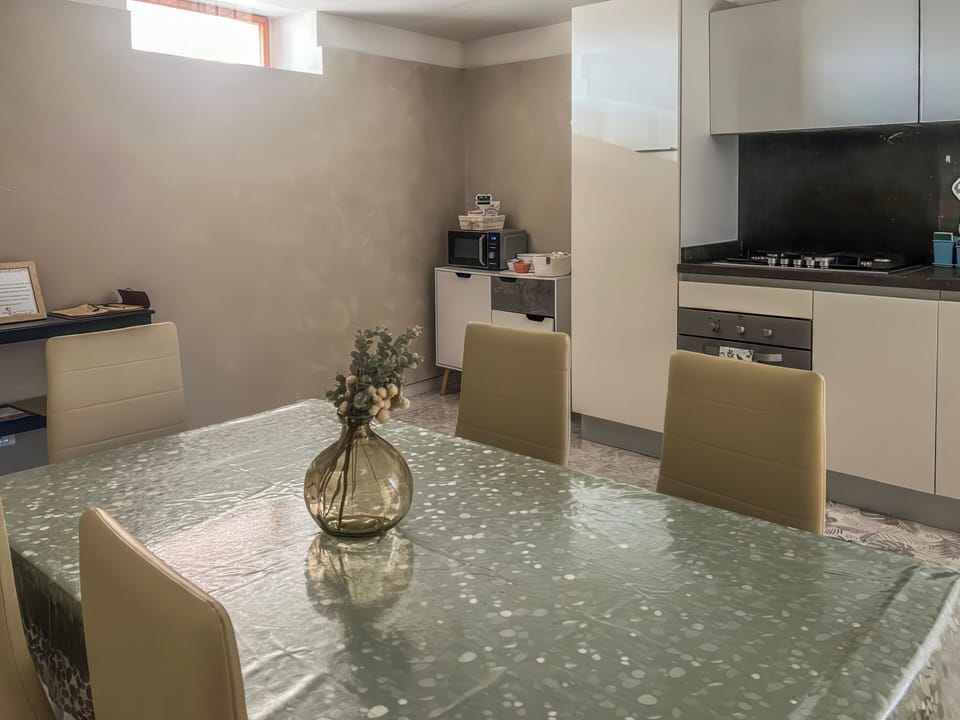 Apartment, 2 Bedrooms, Balcony | Living area | Flat-screen TV