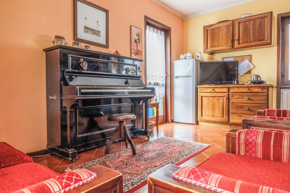 Apartment, 3 Bedrooms, Balcony, Mountain View | Living area | Flat-screen TV