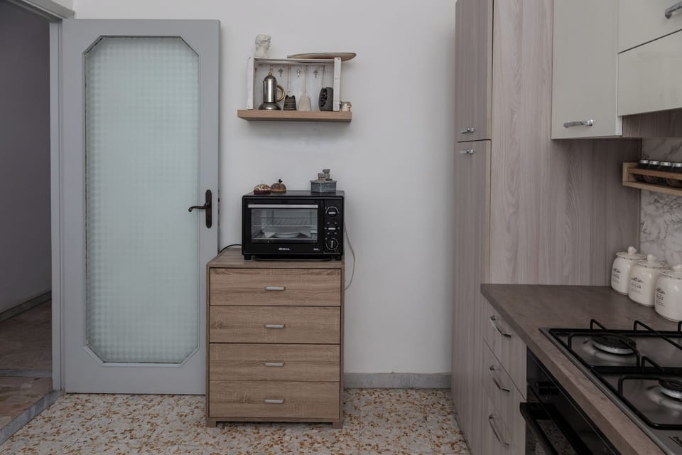 Apartment, 1 Bedroom, Balcony | Private kitchen | Fridge, oven, stovetop, cookware/dishes/utensils