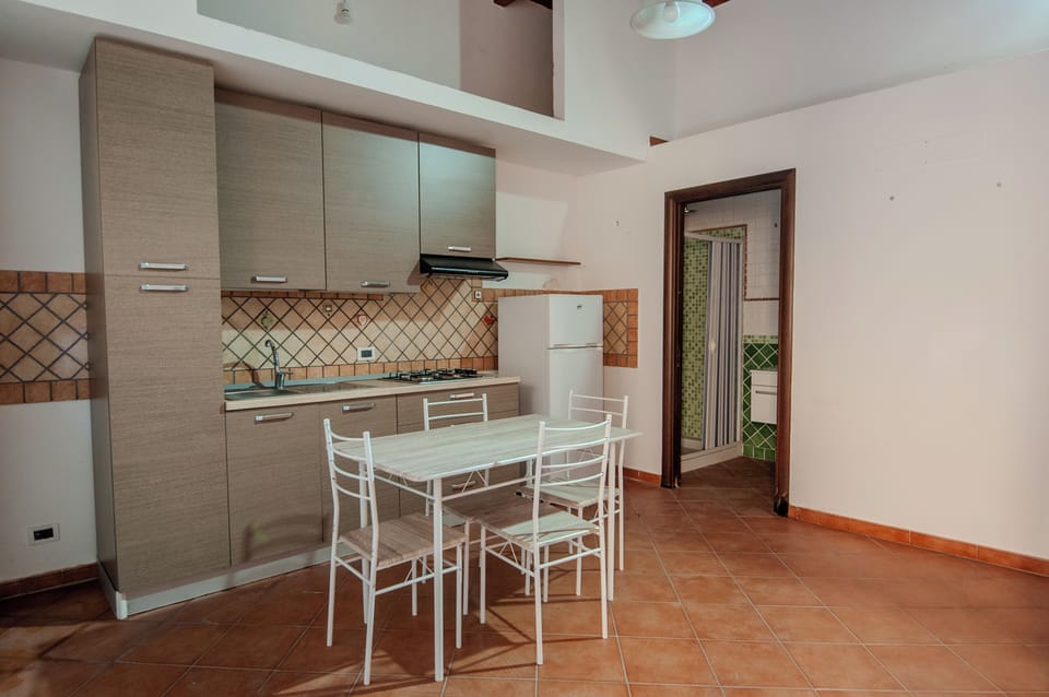 Apartment, 2 Bedrooms, Balcony | Private kitchen | Fridge, oven, stovetop, cookware/dishes/utensils