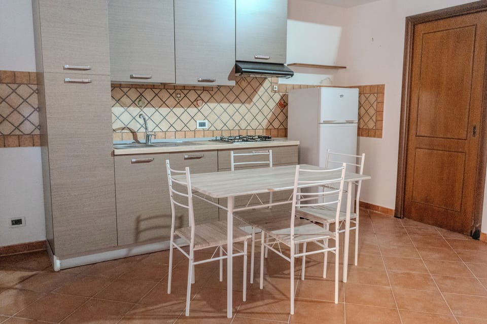 Apartment, 2 Bedrooms, Balcony | Private kitchen | Fridge, oven, stovetop, cookware/dishes/utensils