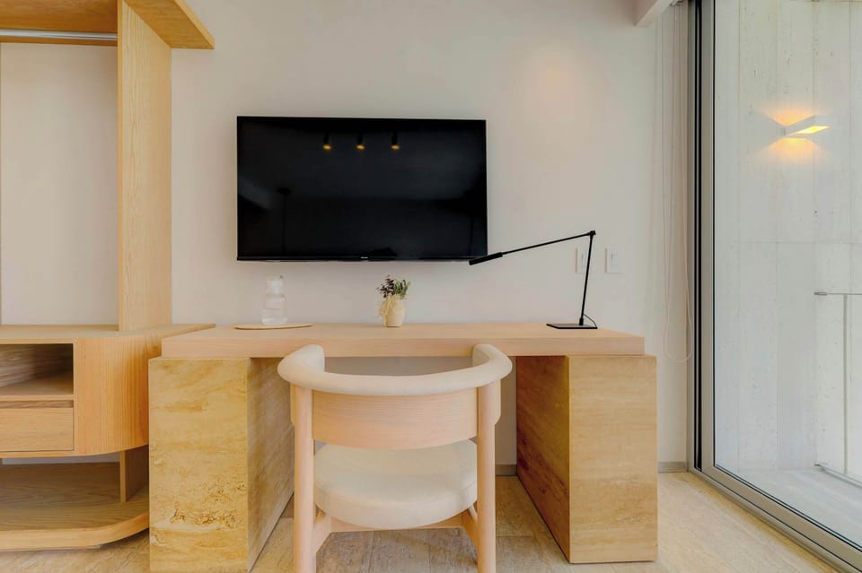 Quiet corner with desk and chair.


