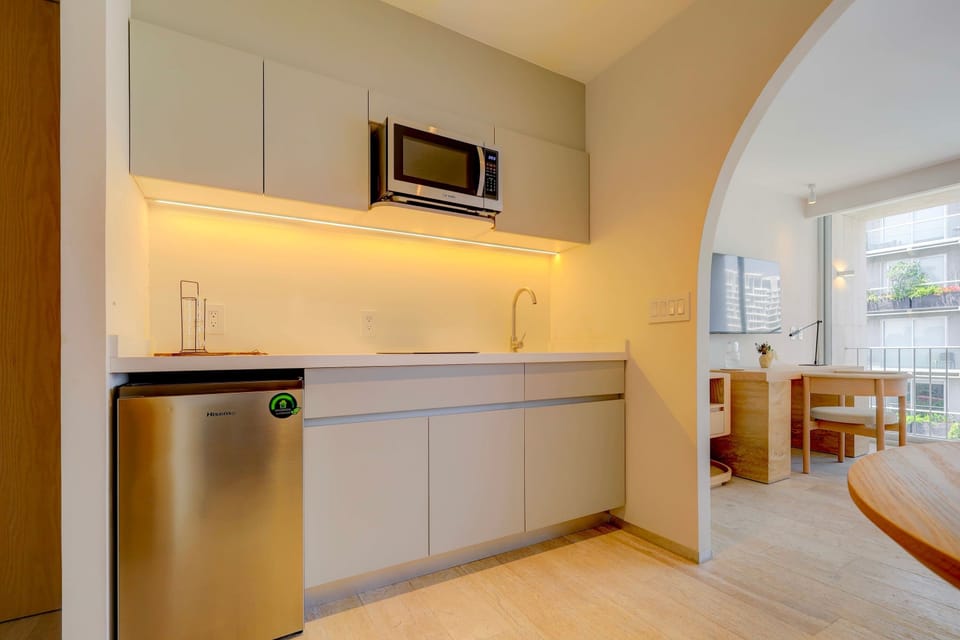 Cook, dine, and unwind in our cozy kitchen space.
