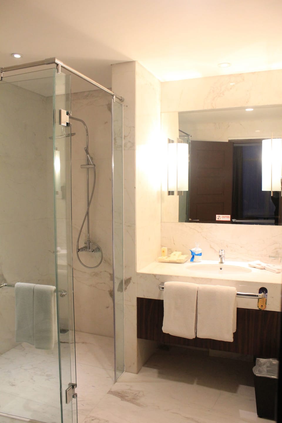 Rainfall showerhead, eco-friendly toiletries, hair dryer, bathrobes