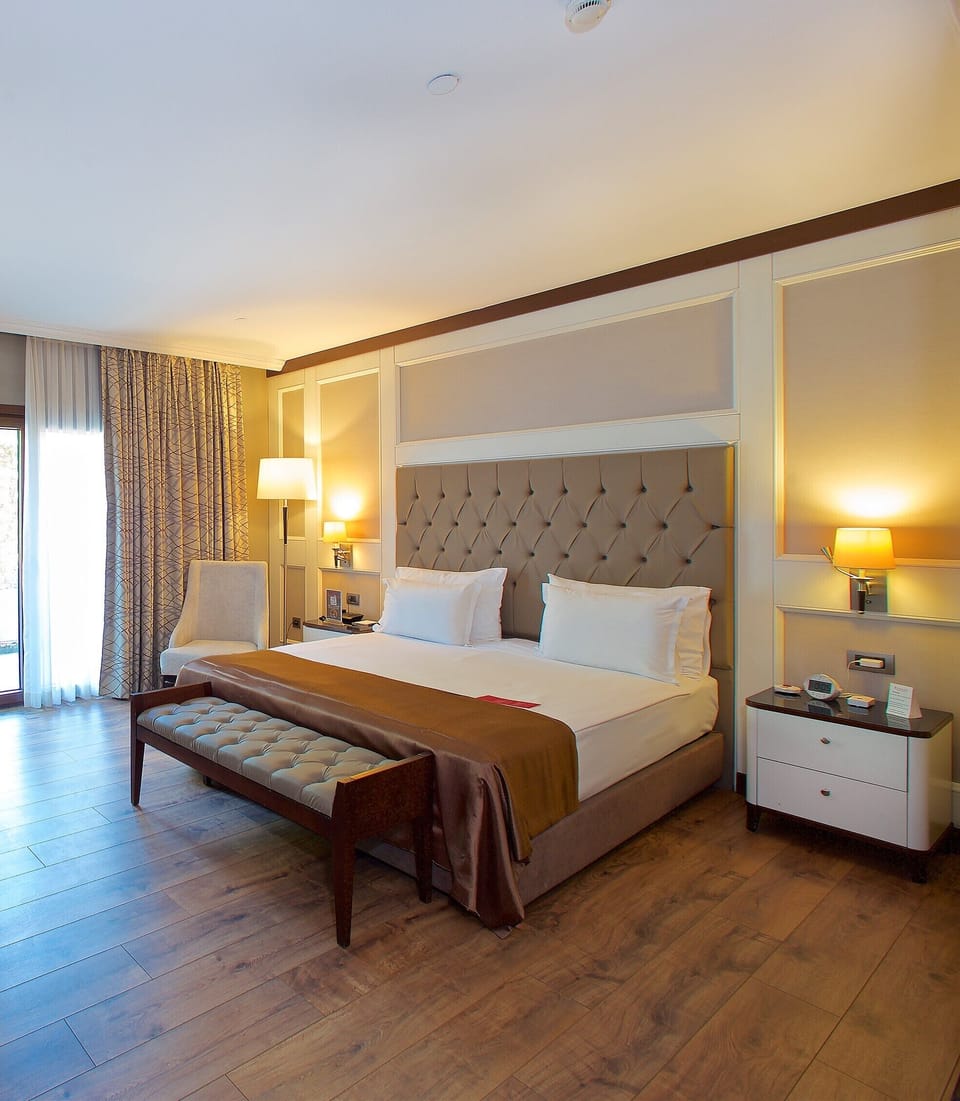 Premium bedding, down comforters, minibar, in-room safe