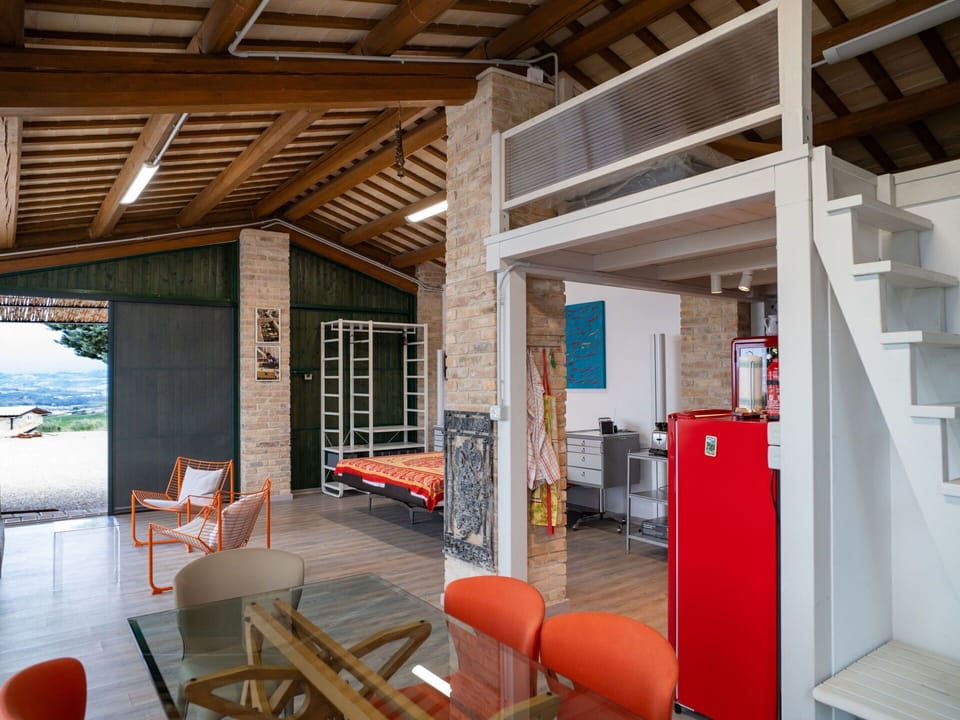 Furniture, Property, Chair, Wood, Orange, Interior Design, Floor, Flooring, Shade, Building