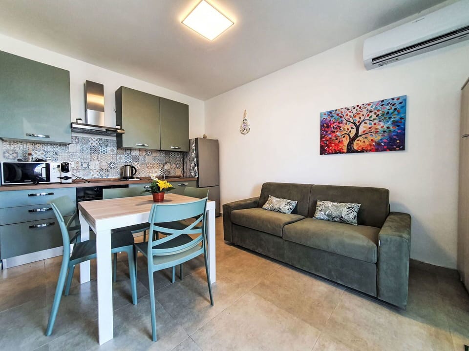 Furniture, Picture Frame, Property, Couch, Countertop, Table, Lighting, Cabinetry, Interior Design, Building