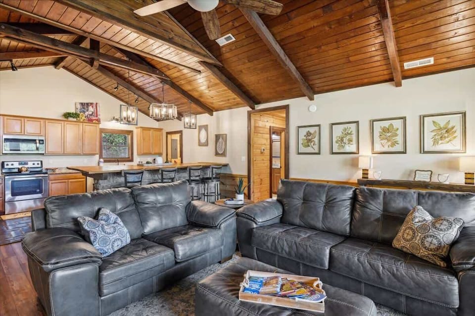 Sunlit space with rustic charm, perfect for family gatherings or cozy movie nights!