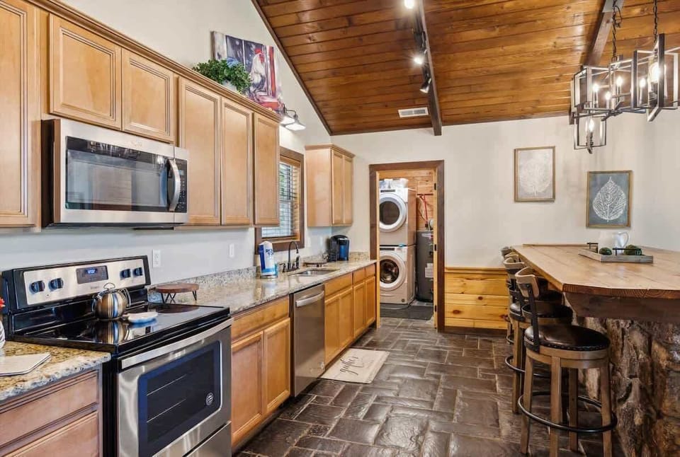 Modern amenities and rustic charm collide in this stylish cooking haven!