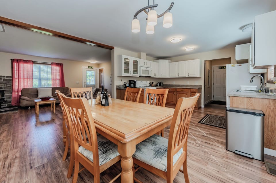 A seamless flow between the living room, dining area, and kitchen makes Maple Cottage ideal for entertaining and spending time with loved ones.