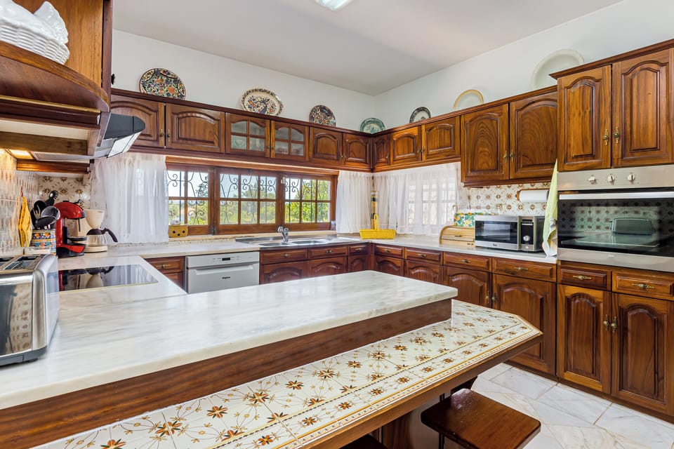 Villa | Private kitchen | Fridge, microwave, oven, stovetop