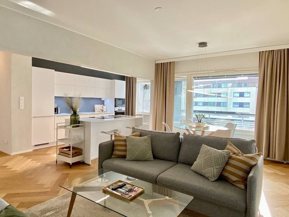 Luxury Apartment, Balcony | Living area | Flat-screen TV