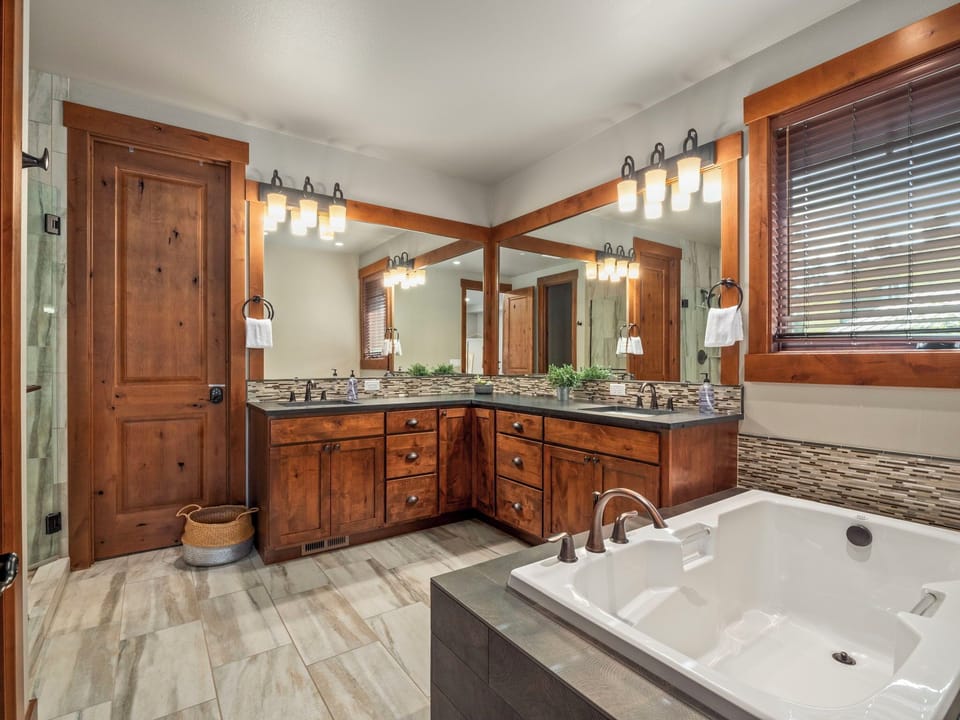 En Suite Master Bathroom with a Jetted Tub and Large Walk in Shower