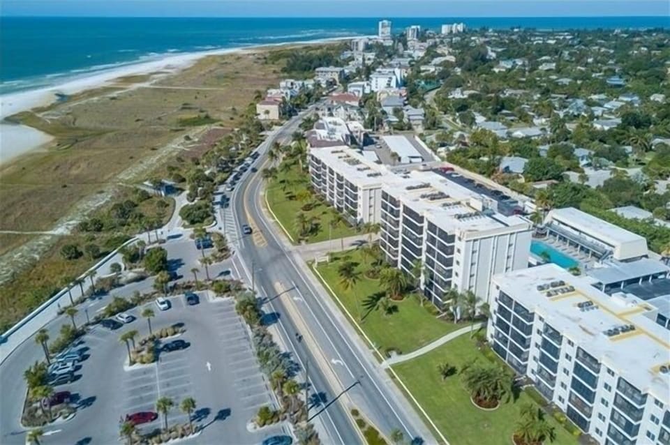 Located in the heart of Siesta Key - Steps from the beautiful, soul heeling quartz sand.