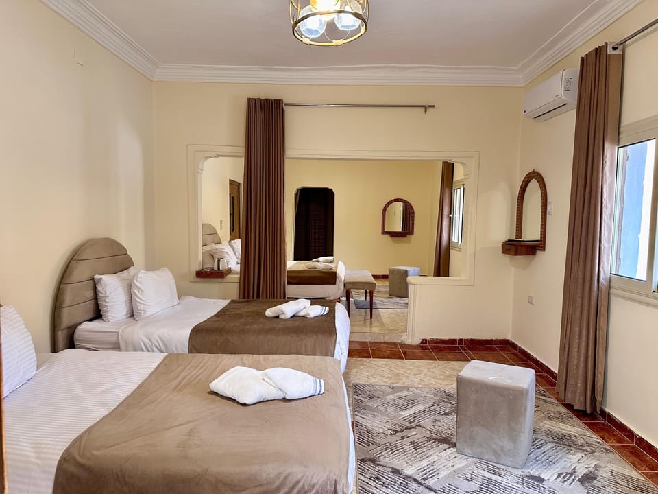 Superior Quadruple Room, City View | In-room safe, soundproofing, free WiFi