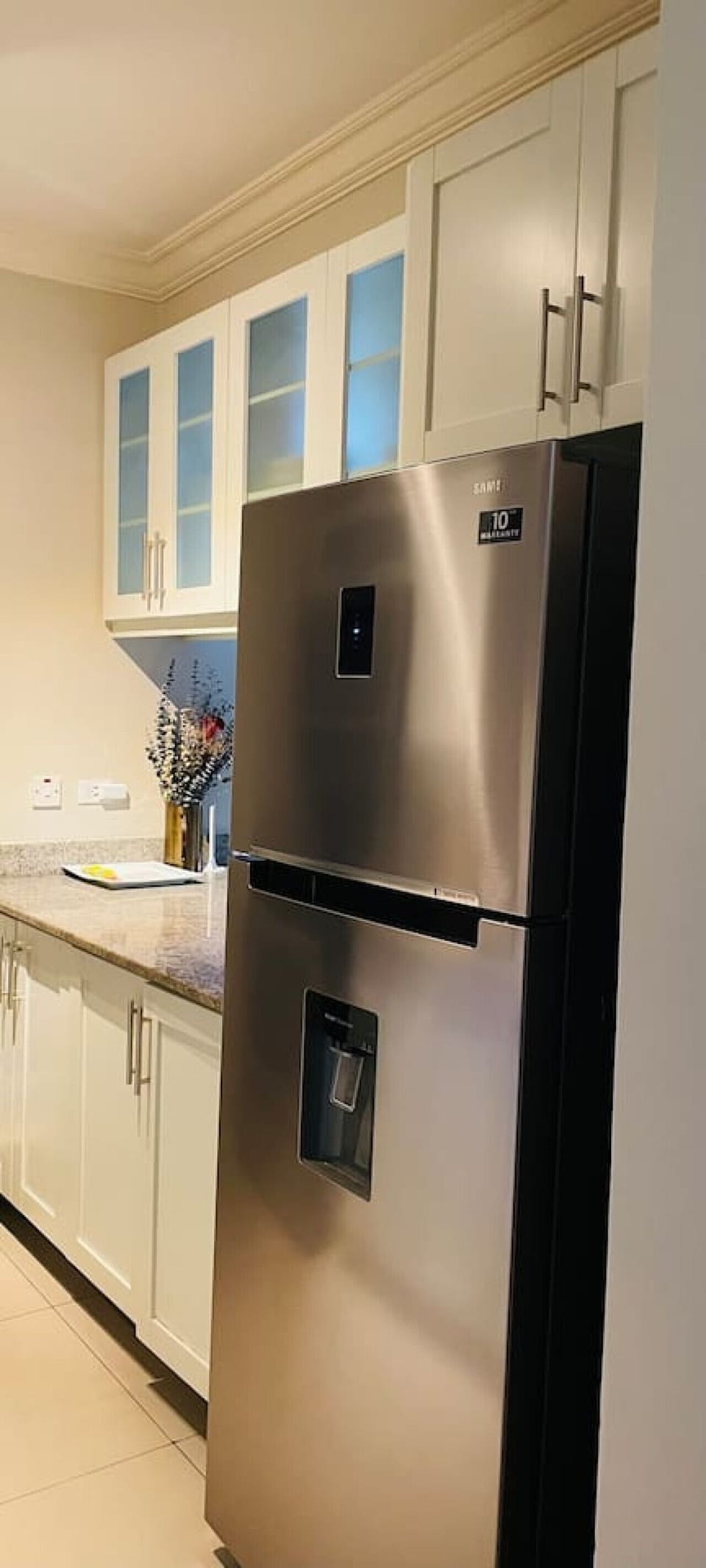 Modern stainless steel refrigerator in the kitchen space