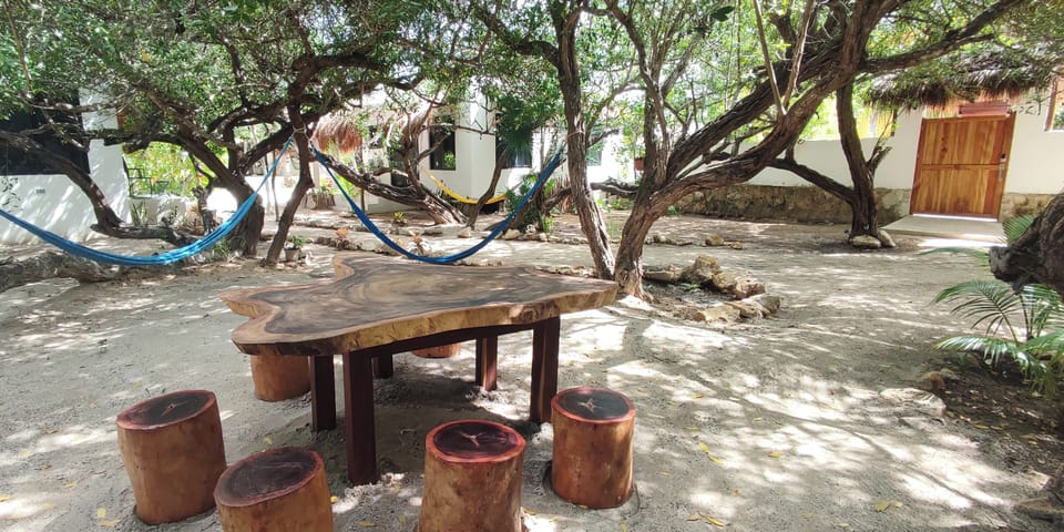 Valentina Holbox, Common space with hammocks and table