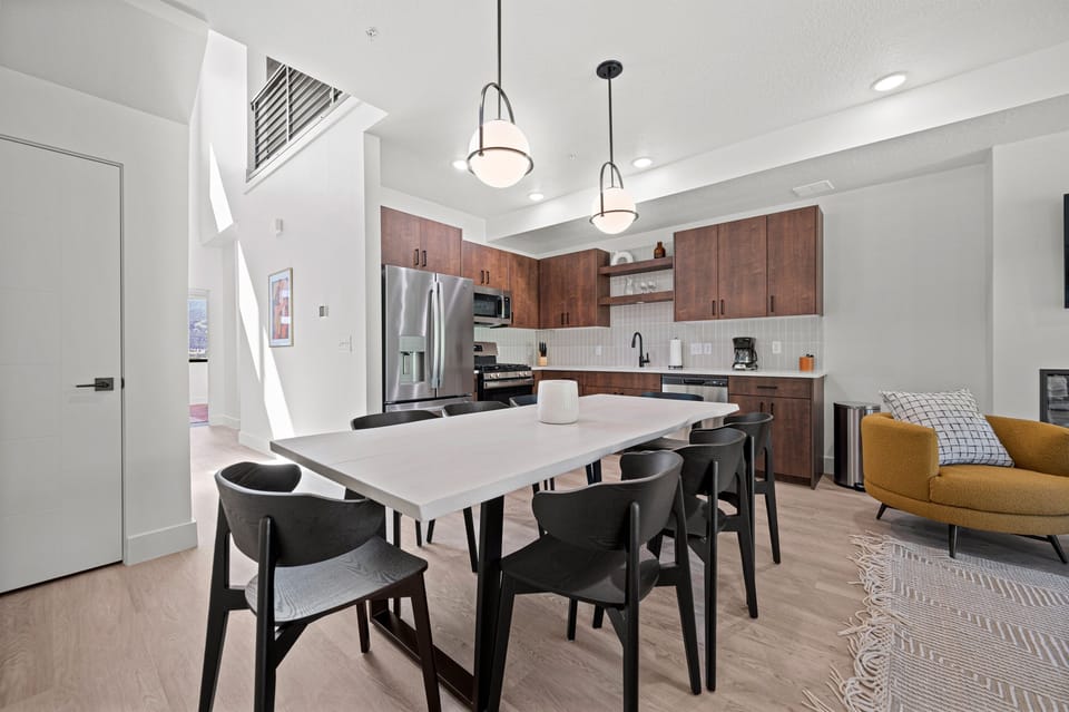 Enjoy meals with family and friends in the dining area, with seating for six.