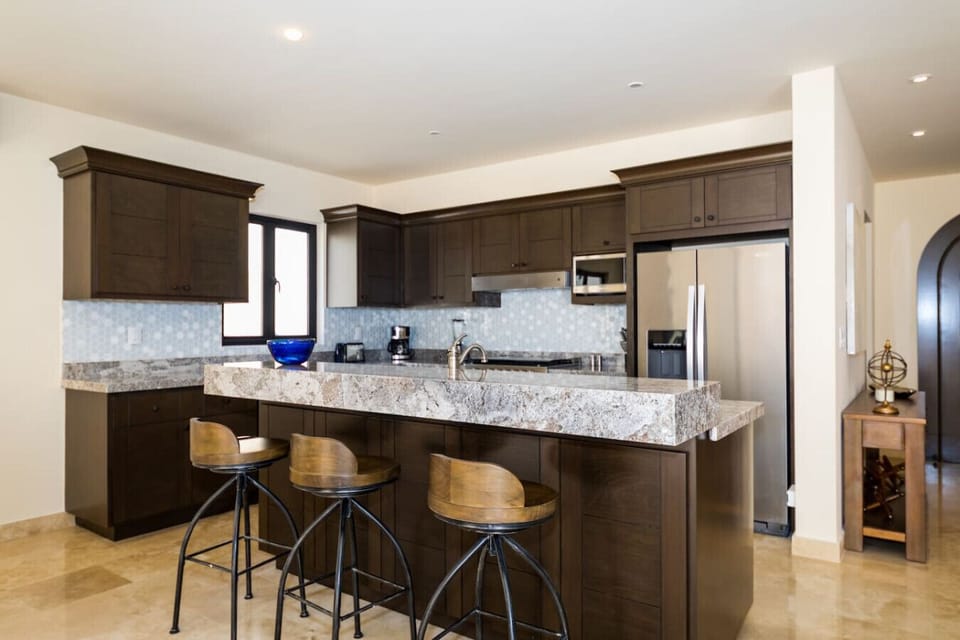 Kitchen Fully Equipped with Appliances and Utensils